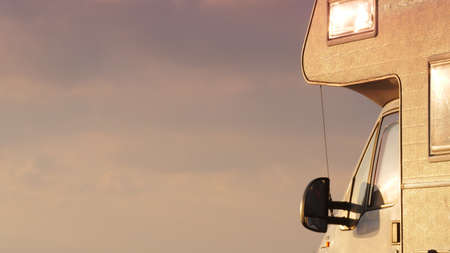Camper rv caravan against sky. Holidays and travel in motor home.