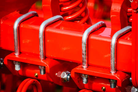 Agriculture equipment. U bolt at agricultural machinery, detail view.の写真素材