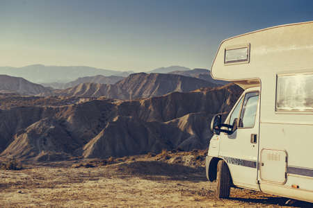 Caravan vehicle camping in Tabernas desert. Almeria province, Andalusia Spain. Traveling with mobile home.の写真素材