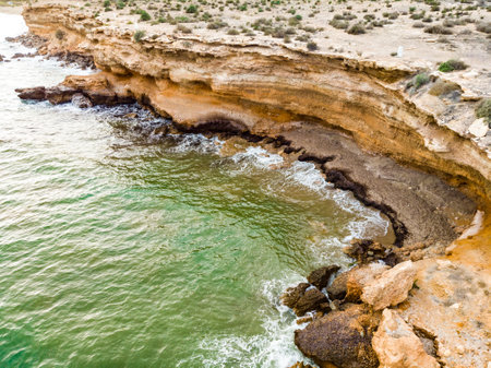 Spanish shoreline with cliffs. Mediterranean region of Mazarron in Murcia, Spainの写真素材