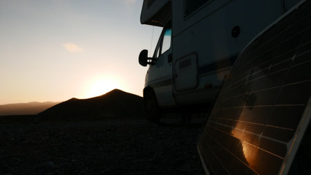 Portable solar photovoltaic panel, charging battery at camper car rv.