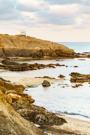 Camper vehicle camping on seaside cliff in wintertime. Mediterranean region of Villaricos, Costa Almeria in Andalusia, Spain.の写真素材