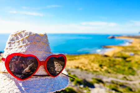 Summer hat on seacoast. Coastal spanish landscape, Calblanque Park in Murcia Spain. Hiking, activity on holidays.の写真素材