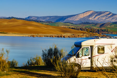 Caravan camping on nature, countryside surrounding lake Embalse del Guadalhorce, Ardales Reservoir, Malaga Andalusia, Spain.の写真素材