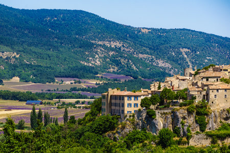 Sault village, health resort in Vaucluse department, Provence in France. Summer landscape with lavender fields in valley.の写真素材