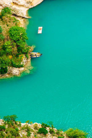 Boats on turquoise water of St Croix Lake, Verdon Gorge in french Alps mountains, Provence France. holiday trip.の写真素材
