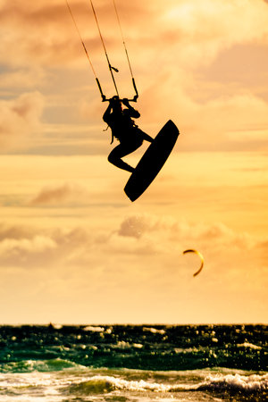 kiteboarding. Kite surfer in action. Tarifa Spain. sports activities. People doing kitesurfing.の写真素材
