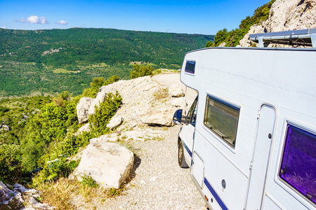 Caravan rv on nature. Verdon Gorge France. Motor home camping car driving through mountain landscape. Adventure with camper vehicle..の写真素材