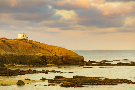 Camper vehicle camping on seaside cliff in wintertime. Mediterranean region of Villaricos, Costa...