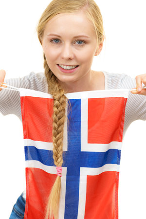Blonde girl braid hair with norwegian flag. Scandinavian people.の写真素材