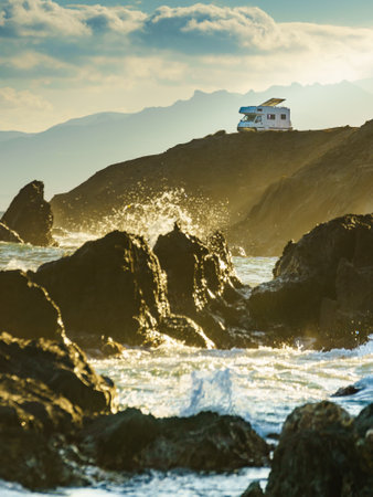 Seaside landscape with camper rv camping on cliff sea shore. Mediterranean region of Villaricos, Costa Almeria in Andalusia, Spainの写真素材