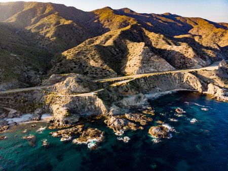Aerial view. Road along spanish rocky shoreline. Mediterranean region of Villaricos, Almeria, eastern Andalusia.の写真素材