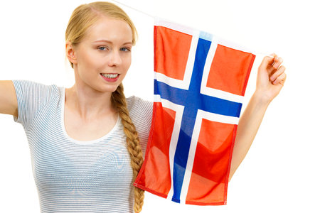 Blonde girl braid hair with norwegian flag. Scandinavian people.の写真素材