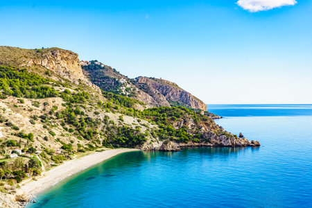 Coast seaside landscape in Andalusia. Cliffs of Maro Cerro Gordo Natural Park, near Nerja, Malaga province, Costa Del Sol, Spain.の写真素材