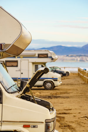 Broken down camper car on sea coast.の写真素材