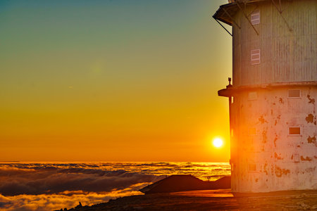 Torre mountain peak at sunset, Serra da Estrela or Star Mountain Range with abandoned observatory. The highest place in Continental Portugal. Tourist attraction.の写真素材