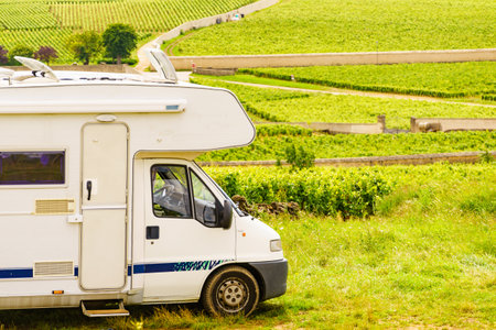 Camper rv visiting vineyard region. Pommard in Burgundy, Cote de Beaune, Cote d'Or, France. Summer holidays, trip attraction with mobile home.の写真素材