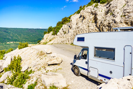 Caravan rv on nature. Verdon Gorge France. Motor home camping car driving through mountain landscape. Adventure with camper vehicle..の写真素材