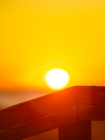 Sunrise over the sea. Sun rising above the horizon.の写真素材