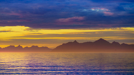 Seascape on Andoya island, beach seashore at midnight sun during summer, Vesteralen archipelago, Norway.の写真素材