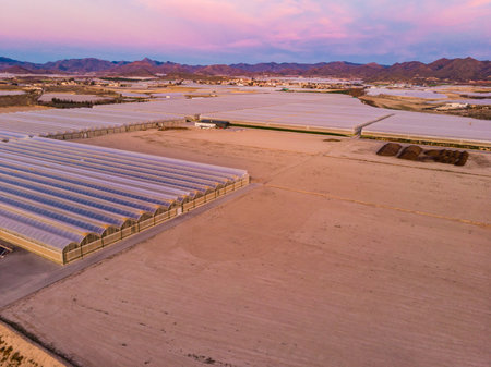 Aerial view of spanish coast view with commercial greenhouses. Industrial agriculture. Mediterranean region of Mazarron, Sierra de las Moreras in Murcia Spain.の写真素材