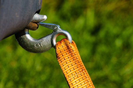 Tow hook with orange strap on car. Towing equipment. Tuggingの写真素材