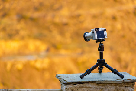 Camera on tripod take photo from natureの写真素材