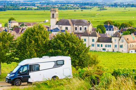 Camper rv visiting Pommard village in Burgundy, Cote de Beaune, Cote d'Or, France. Summer holidays, trip attraction with mobile home.の写真素材