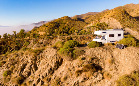 Camper rv camping on cliff sea shore. Mediterranean region of Villaricos, Costa Almeria in Andalucia, Spainの写真素材