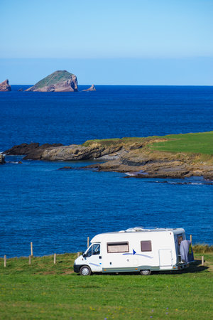 Camper camping on Asturias coast, northern Spain.の写真素材