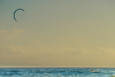 Kiteboarding. Kite surfer in action. Tarifa Spain. Sports activities. People doing kitesurfing.の写真素材