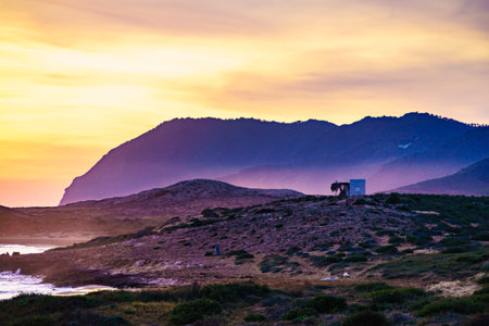 Scenic sunset over seashore. Seaside landscape. Calblanque Beach, Murcia Spain.の写真素材