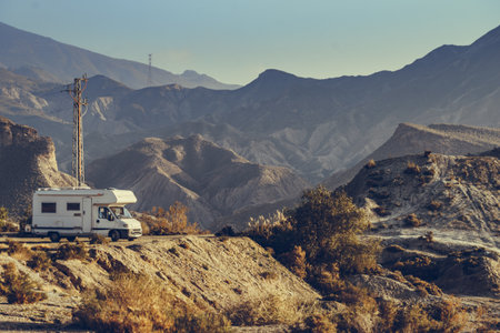 Caravan vehicle camping in Tabernas desert. Almeria province, Andalusia Spain. Traveling with mobile home.の写真素材