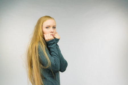 Sad upset young female. Girl feels unhappy, problem in personal life, heartbreak.の写真素材