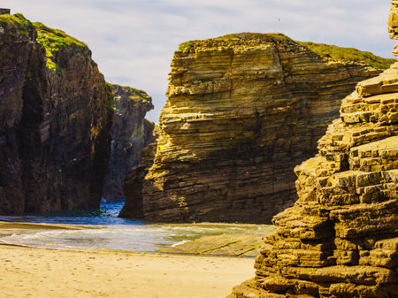 Cantabric sea coast view in northern Spain. Ocean at low tide. Playa las Catedrales, Catedrais beach in Ribadeo, province of Lugo, Galicia.の写真素材