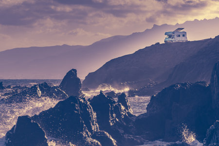 Seaside landscape with camper rv camping on cliff sea shore. Mediterranean region of Villaricos, Costa Almeria in Andalusia, Spainの写真素材