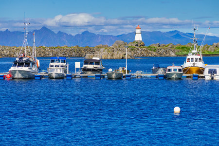 Fishing boat in port at Hovsund village, Gimsoya Lofoten Islands in Norway