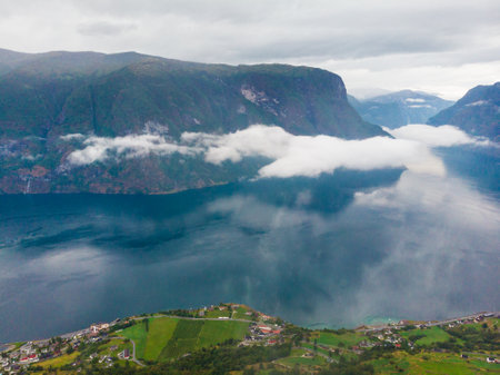 Clouds over the fjord. Aurlandsfjord landscape at morning. Norway Scandinavia. National tourist route Aurlandsfjellet.の写真素材