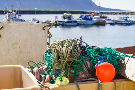 Old port fishing equipment on pier at Hovsund village. Gimsoya Lofoten Islands in Norway