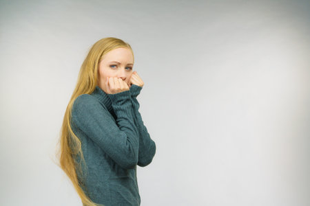 Sad upset young female. Girl feels unhappy, problem in personal life, heartbreak.の写真素材