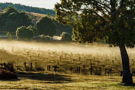 Hazy foggy weather in early morning over Sad Hill Cemetery in Burgos, Spain. Tourist place, spaghetti western film location.の写真素材