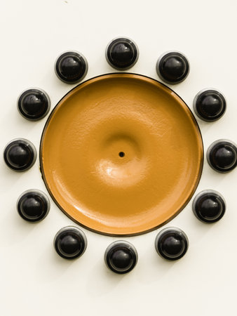 Close up of yellow detailed black bolts screws on car truck wheel. Abstract background concept.の写真素材