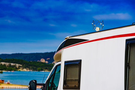 Travel holidays in motorhome. Antenna on roof of camper car. TV connection.の写真素材
