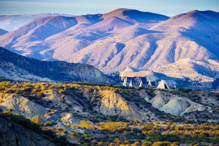 Tabernas desert landscape and Red Indian village with wigwams at Western Leone town, Almeria, Spain....