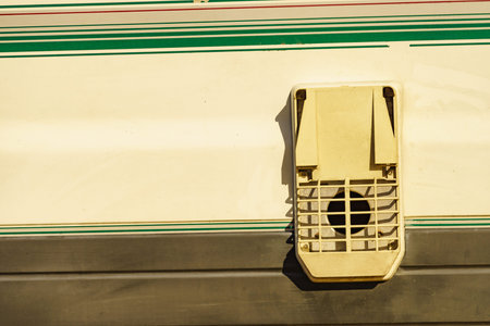 Camper car rv detail view. Grid, chimney ventilation plate for boiler