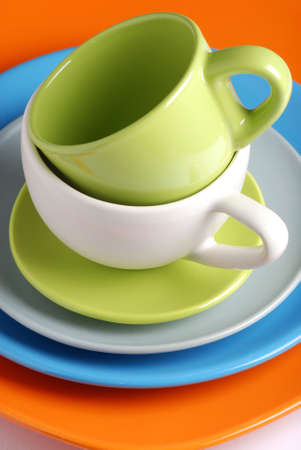 colorful ceramic kitchen utensils on white backgroundの写真素材