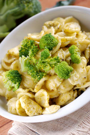 Traditional Italian pasta, orecchiette with broccoli on the tableの写真素材