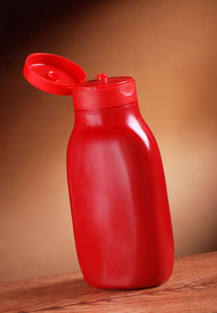 ketchup bottle on the wooden table