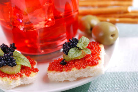 canapes with red and black caviarの写真素材