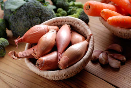 group of shallots in small basket